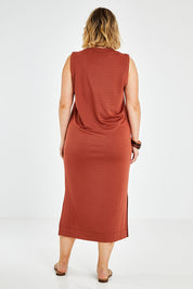 Model Jess wearing size 14 of the Ready For Anything Tank Dress in colour Ochre, from the back