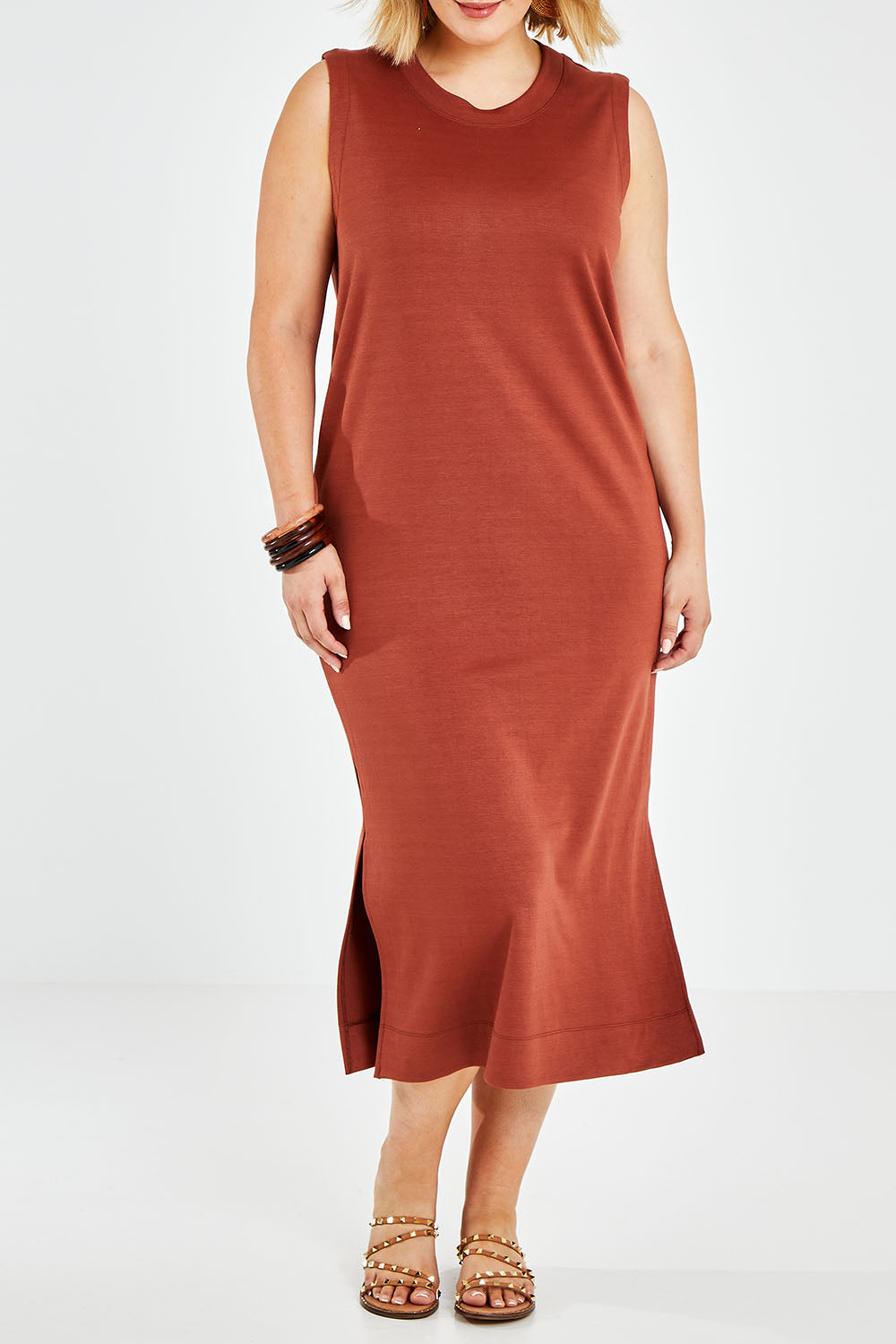 Model Jess wearing size 14 of the Ready For Anything Tank Dress in colour Ochre, from the front, cropped image
