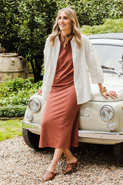 Model Tegan wearing size 10 of the Ready For Anything Tank Dress in colour Ochre, from the front, showing the whole outfit