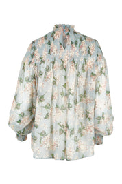 Product shot of the Romance In The Air Blouse in colour Skyfleur (Blue), from the back