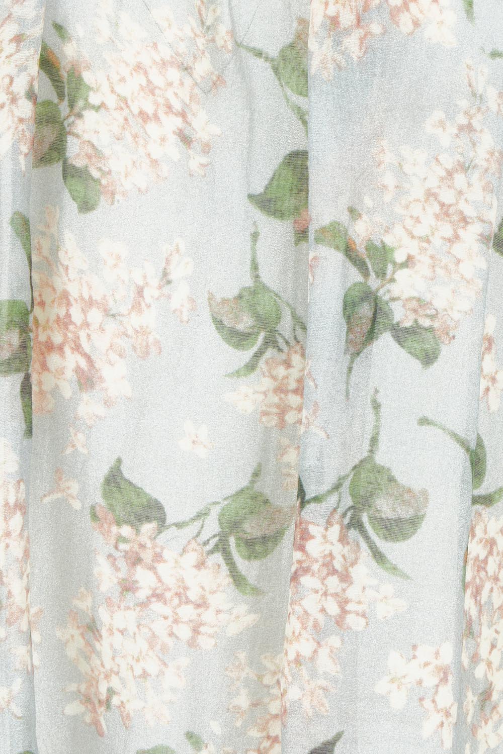 Product shot of the Romance In The Air Blouse in colour Skyfleur (Blue), detail