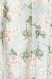 Product shot of the Romance In The Air Blouse in colour Skyfleur (Blue), detail