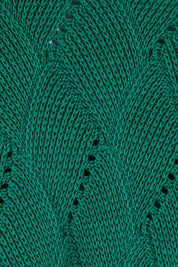 Product shot of the Cross My Heart Stitch Sweater in colour Jade (Green), detail