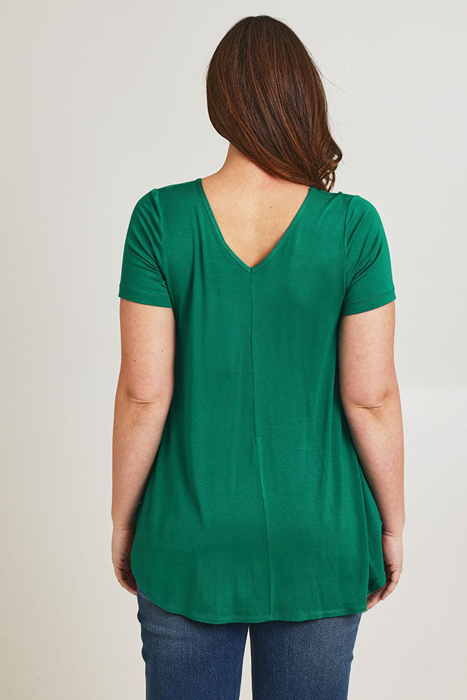 Model Jane wearing size 14 of the Softly Swinging Bamboo Tee in colour Lushgreen (Green), from the back