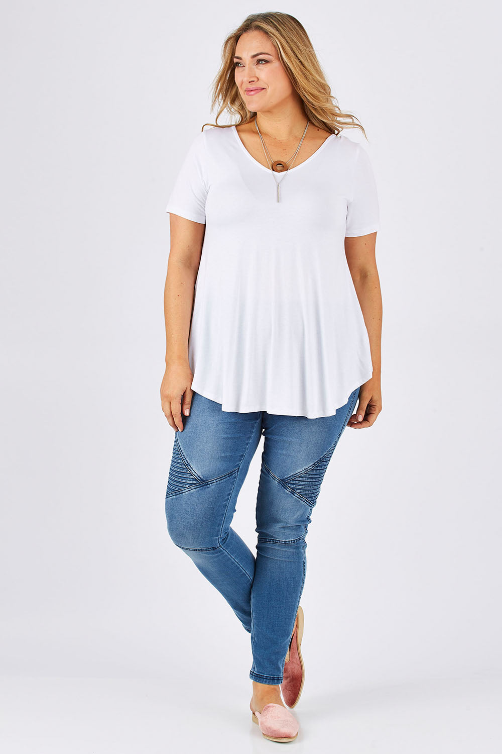 Model Ljubenka wearing size 18 of the Softly Swinging Bamboo Tee in colour White (White), from the front, showing the whole outfit