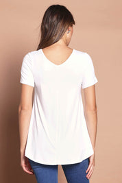 Model Madeline wearing size 10 of the Softly Swinging Bamboo Tee in colour White (White), from the back
