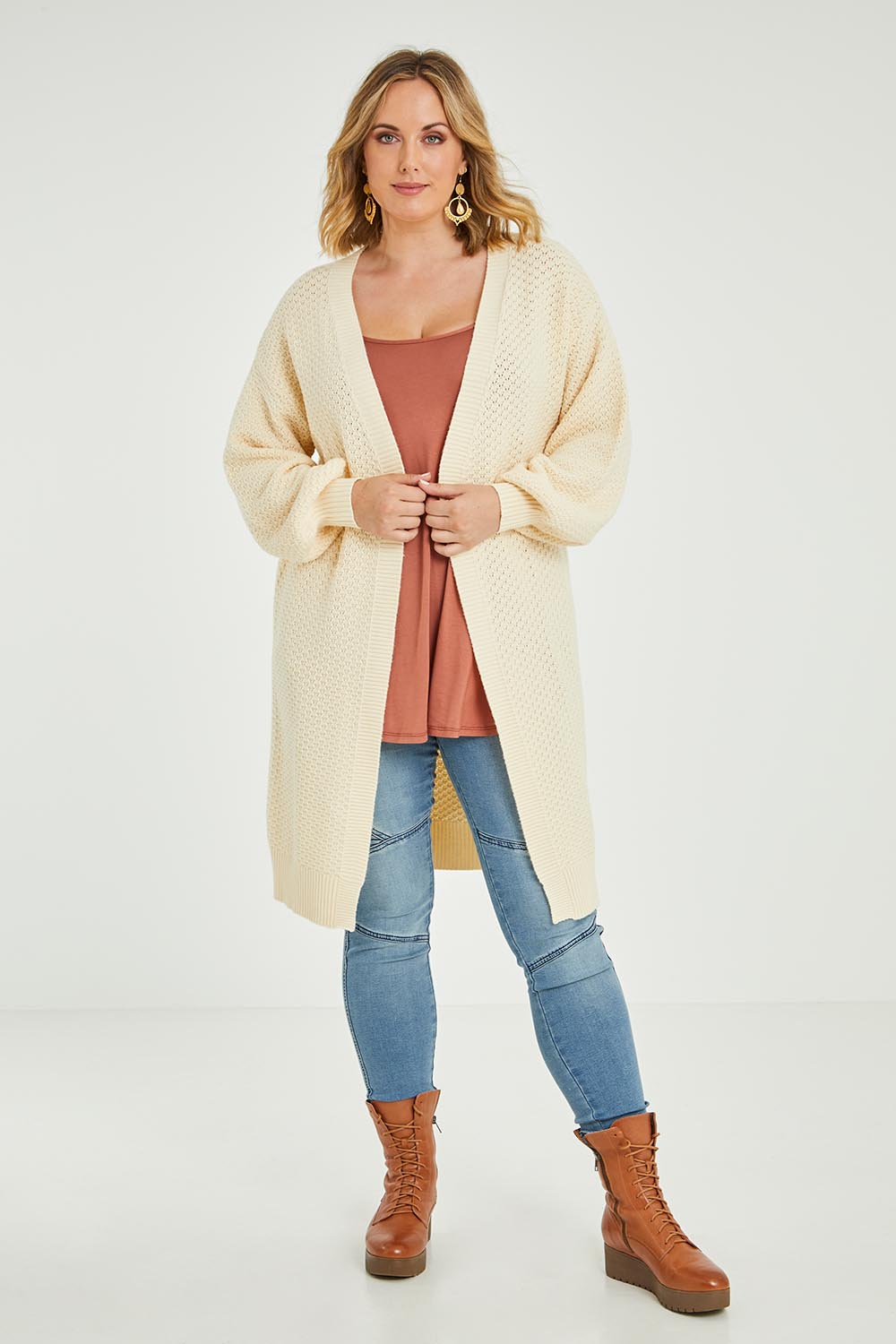 Model Jess wearing size L of the Adjourn To The Drawing Room Cardi in colour Buttermilk, from the front, showing the whole outfit