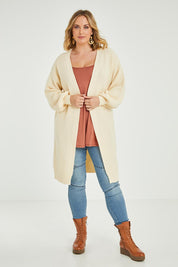 Model Jess wearing size L of the Adjourn To The Drawing Room Cardi in colour Buttermilk, from the front, showing the whole outfit