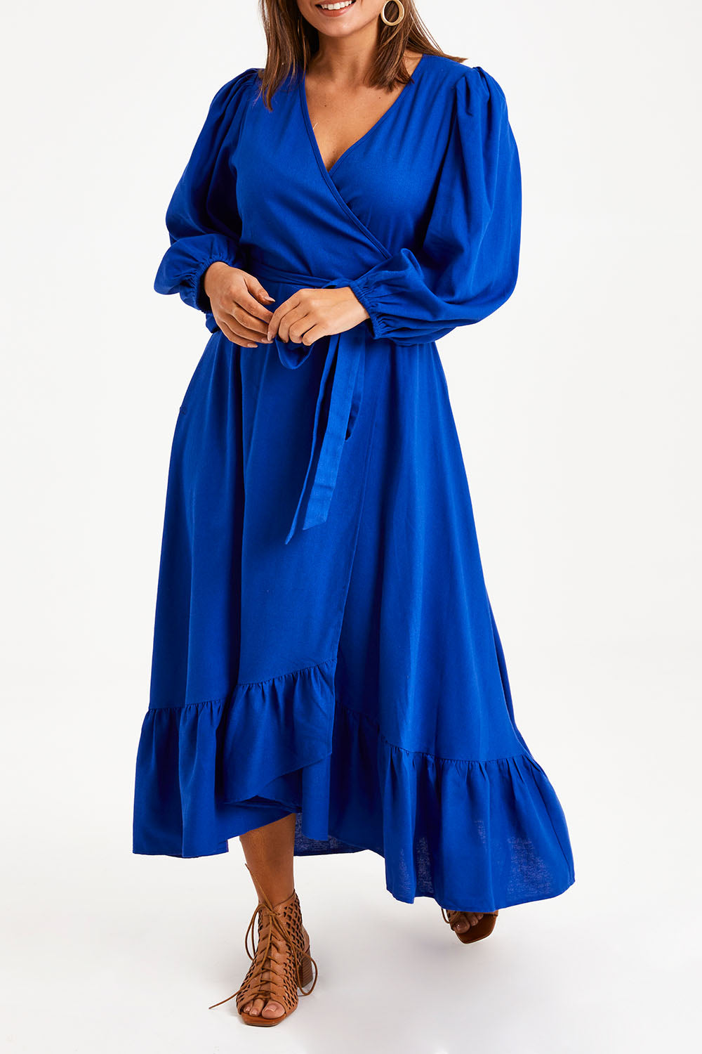 Model Monique wearing size 14 of the La Dolce Vita Linen Wrap Maxi in colour Sapphire (Blue), from the front, cropped image
