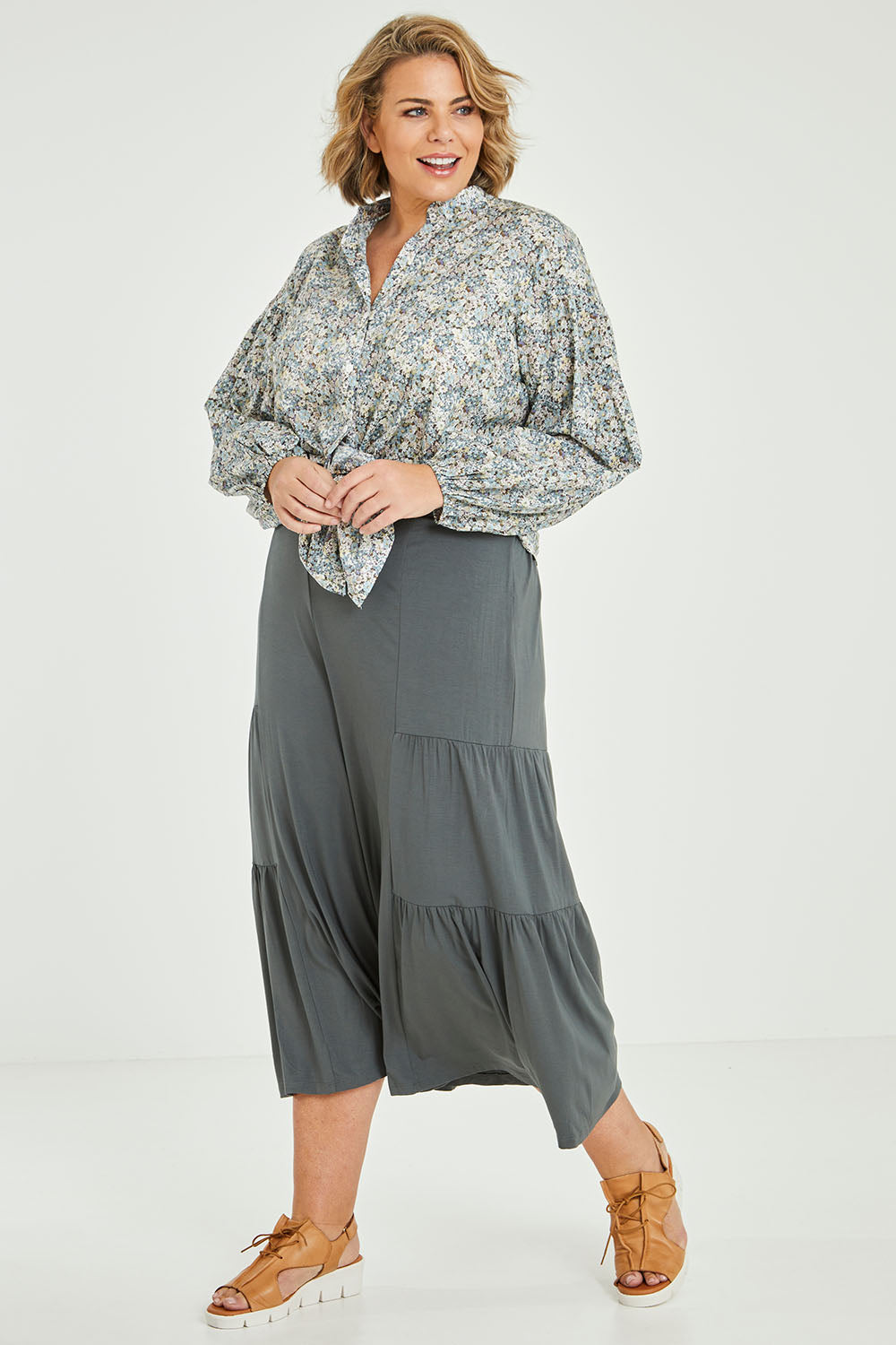Model Fiona wearing size 16 of the You And Me Cotton Floral Blouse in colour Skyfleur (Blue), from the front, showing the whole outfit