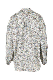 Product shot of the You And Me Cotton Floral Blouse in colour Skyfleur (Blue), from the back