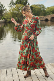 Model Tegan wearing size 10 of the Wrap Me Up In Cotton Maxi Dress in colour Greenfleur (Green), from the front, showing the whole outfit