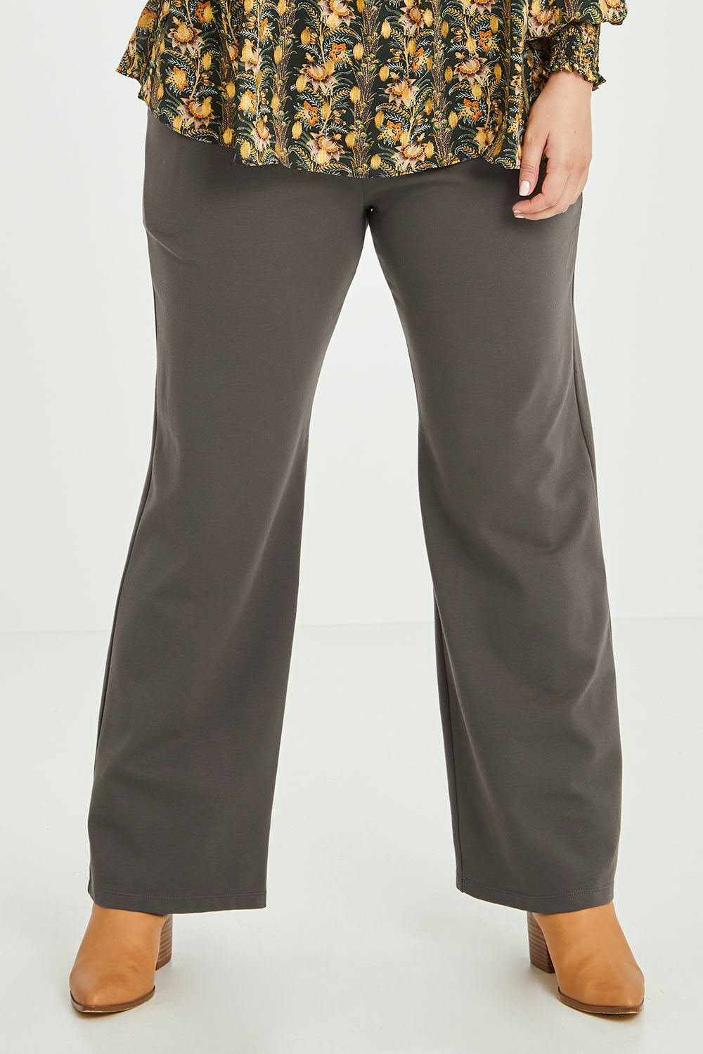 Model Jess wearing size 14 of the Meet Me At Midnight Ponte Pants in colour Olive (Green), from the front, cropped image