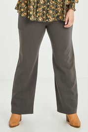 Model Jess wearing size 14 of the Meet Me At Midnight Ponte Pants in colour Olive (Green), from the front, cropped image
