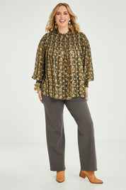 Model Jess wearing size 14 of the Meet Me At Midnight Ponte Pants in colour Olive (Green), from the front, showing the whole outfit