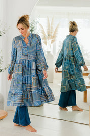 Model Tegan wearing size 10 of the Floating Through The Day Midi Dress in colour Patch (Blue), from the front, showing the whole outfit