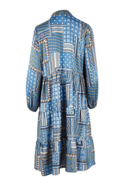 Product shot of the Floating Through The Day Midi Dress in colour Patch (Blue), from the back