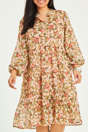 Model Terri-Leigh wearing size 14 of the Floating Through The Day Dress in colour Garden (Pink), from the front, cropped image