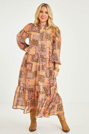 Model Katie wearing size 16 of the Not A Patch On You Dress in colour Muskpatch (Pink), from the front, showing the whole outfit