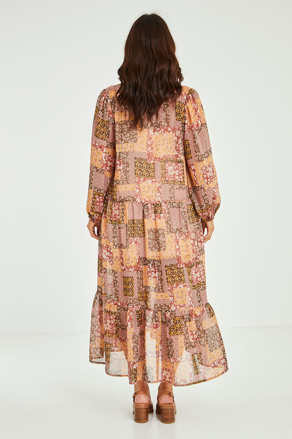 Model Laura wearing size 14 of the Not A Patch On You Dress in colour Muskpatch (Pink), from the back