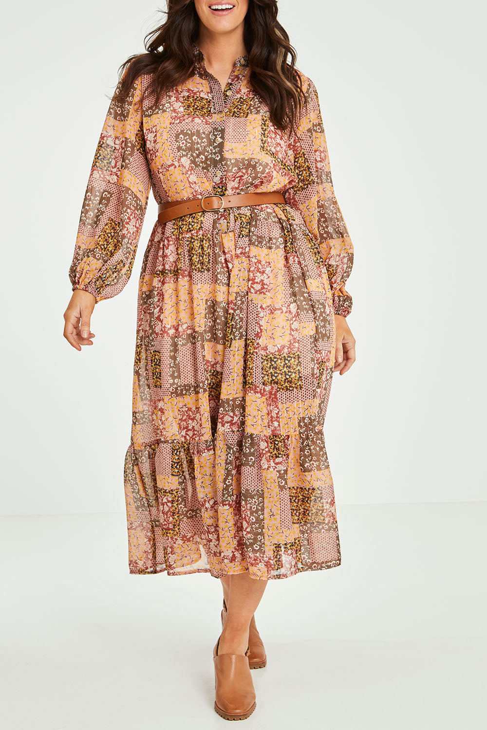Model Laura wearing size 14 of the Not A Patch On You Dress in colour Muskpatch (Pink), from the front, cropped image