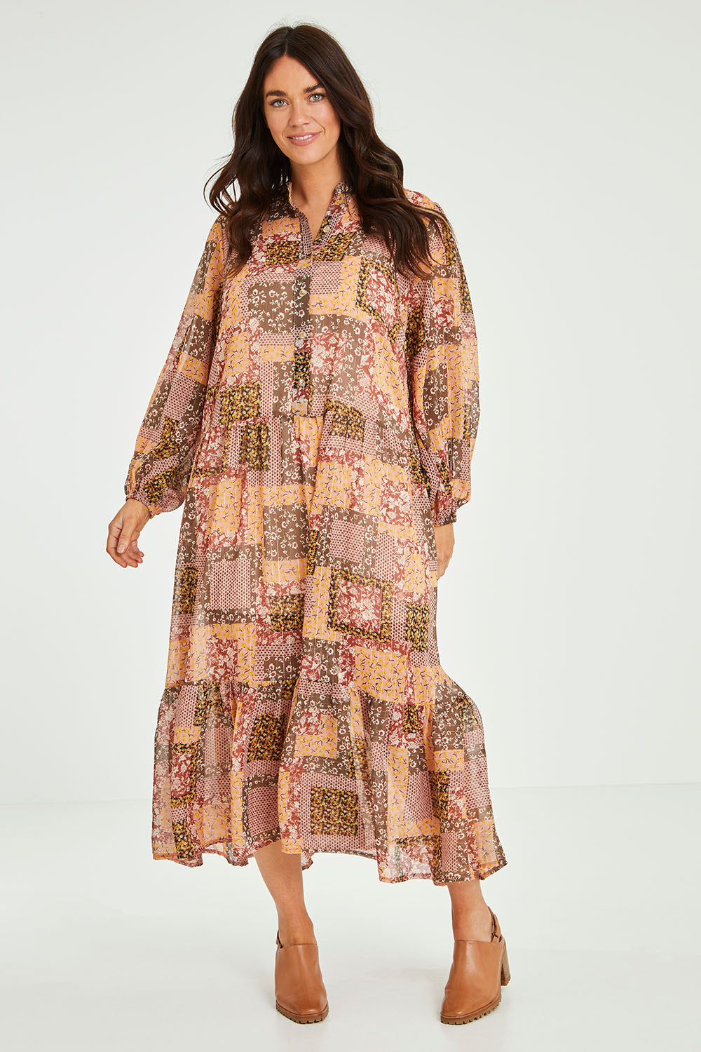 Model Laura wearing size 14 of the Not A Patch On You Dress in colour Muskpatch (Pink), from the front, showing the whole outfit