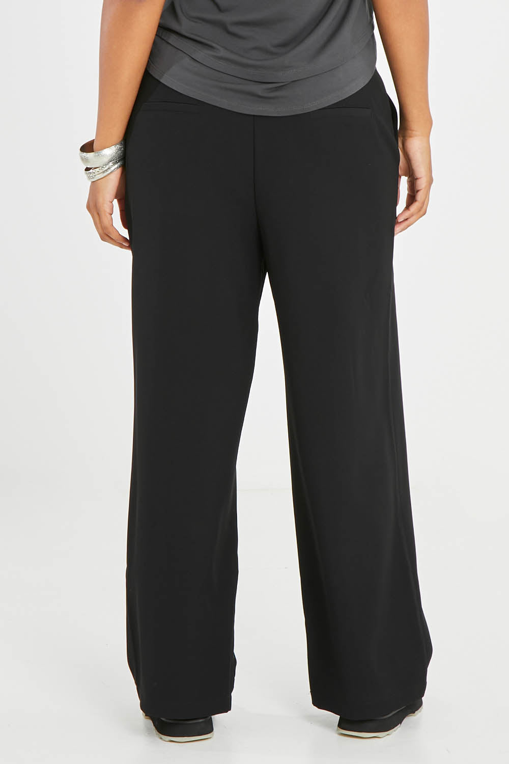 Model Noli wearing size 14 of the All For Love Pants in colour Black (Black), from the back