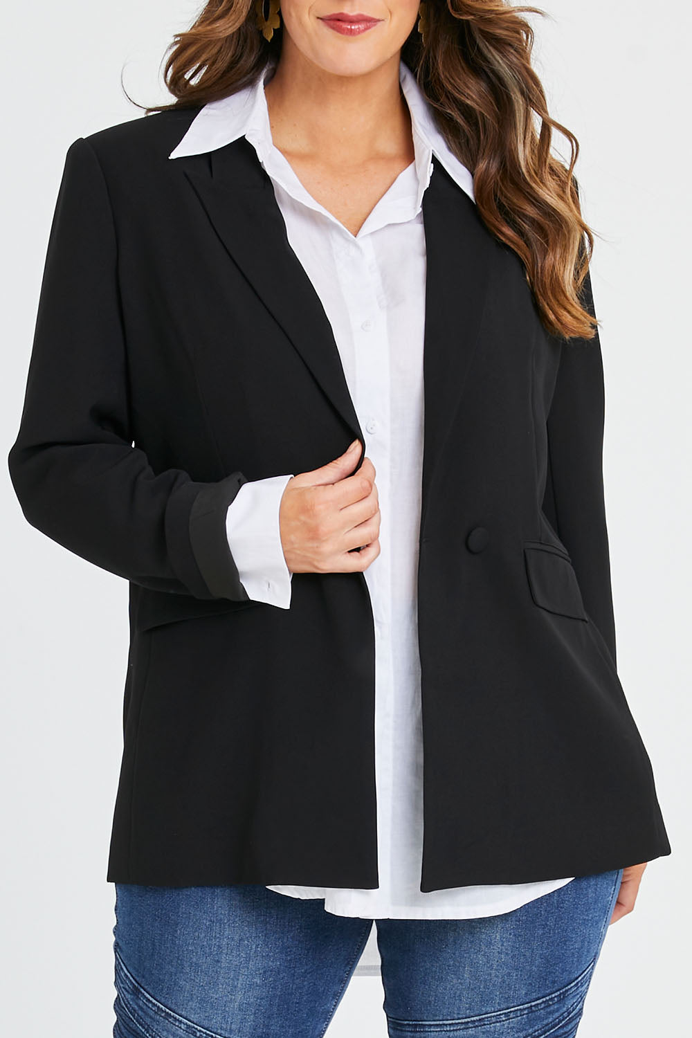 Model Laura wearing size 14 of the All For Love Blazer in colour Black (Black), from the front, cropped image