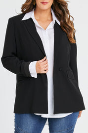 Model Laura wearing size 14 of the All For Love Blazer in colour Black (Black), from the front, cropped image