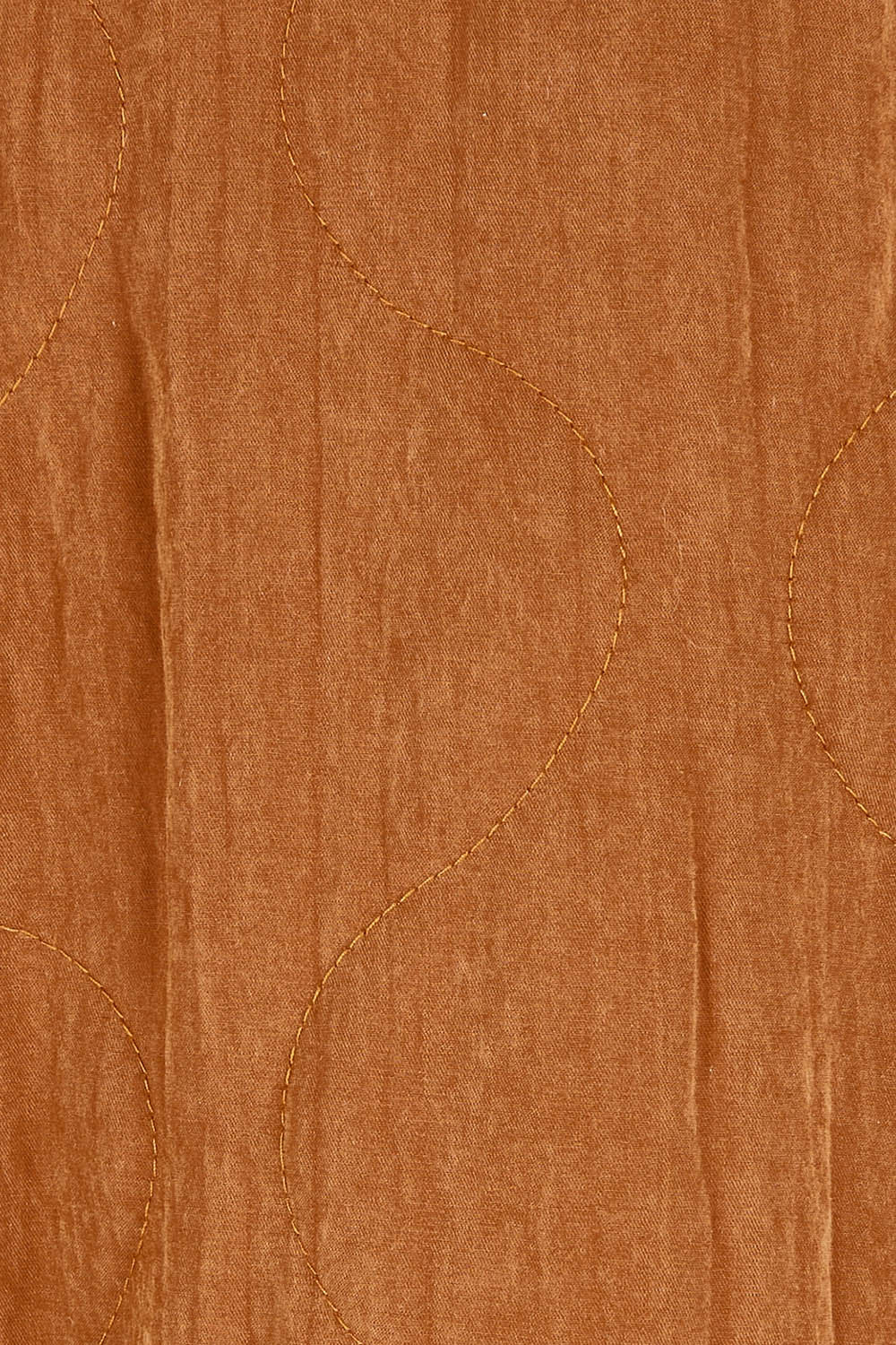Product shot of the Heart Warming Quilted Anorak in colour Rust, detail