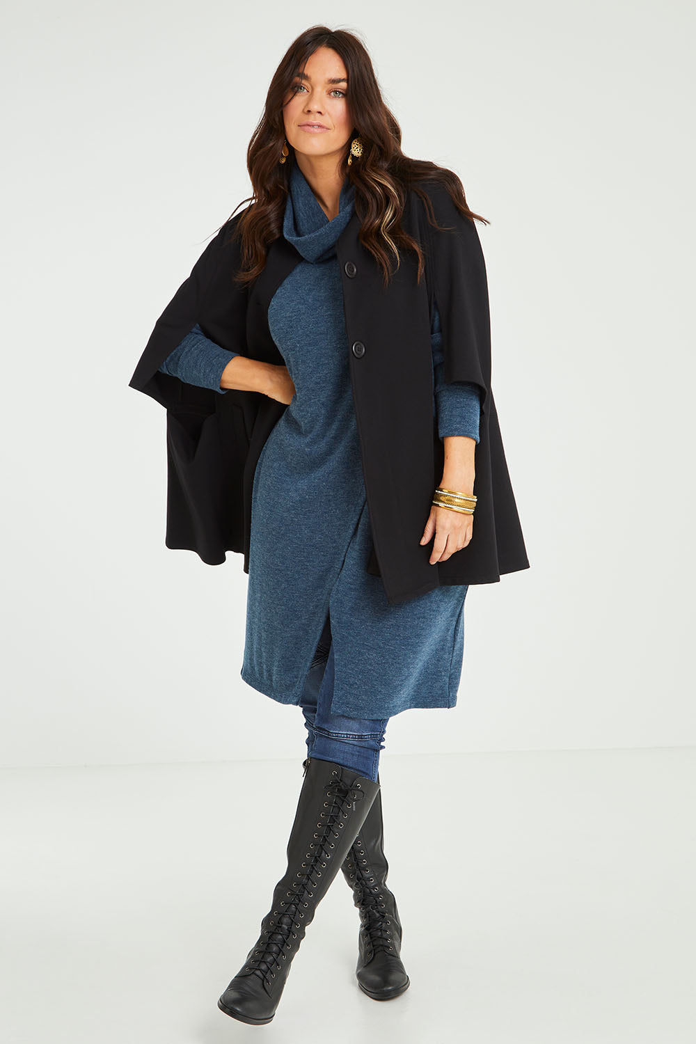 Model Laura wearing size 14 of the Sherlock And I Ponte Cape in colour Black (Black), from the front, showing the whole outfit