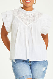 Model Noli wearing size 14 of the Feel Good Friday Blouse in colour Milk (White), from the front, cropped image