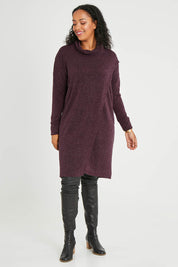 Model Noli wearing size 14 of the Cross My Heart Tunic in colour Wine (Purple), from the front, showing the whole outfit