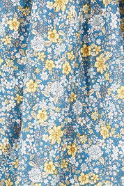 Product shot of the Light Of The Sun Cotton Dress in colour Bluefleur (Blue), detail