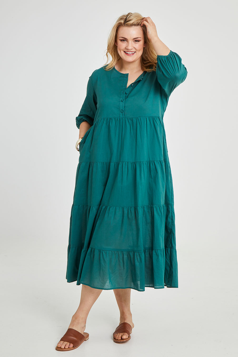 Model Keeara wearing size 16 of the Tiers Of Joy Cotton Maxi Dress in colour Pine (Green), from the front, showing the whole outfit