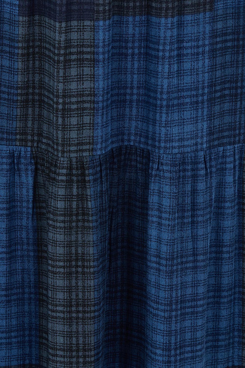 Product shot of the Chasing Sunsets Skirt in colour Bluecheck (Blue), detail