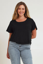 Model Chanel wearing size 16 of the Short And Sweet Bamboo Layered Tee in colour Black (Black), from the front, cropped image