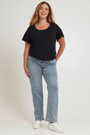 Model Chanel wearing size 16 of the Short And Sweet Bamboo Layered Tee in colour Black (Black), from the front, showing the whole outfit