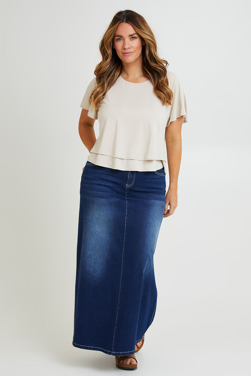 Model Laura wearing size 14 of the Short And Sweet Bamboo Layered Tee in colour Natural, from the front, showing the whole outfit