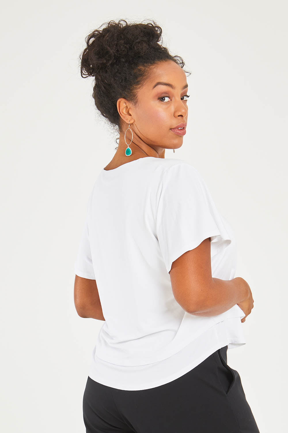 Model Noli wearing size 14 of the Short And Sweet Bamboo Layered Tee in colour White (White), from the back