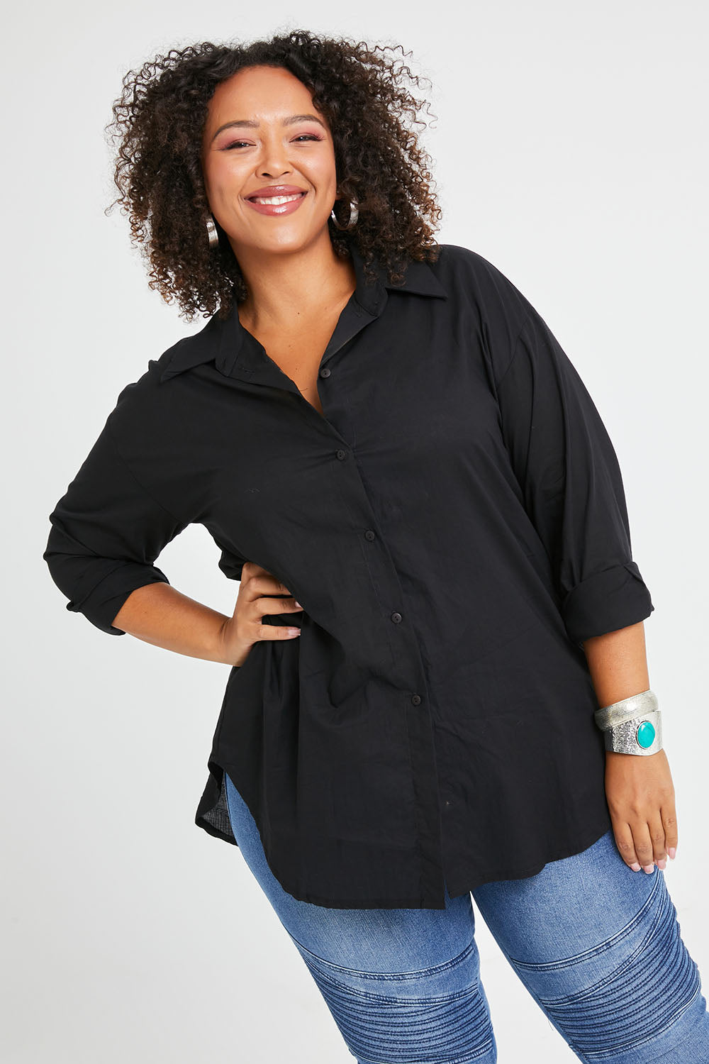 Model Alexis wearing size 16 of the Relaxed Elegance Boyfriend Shirt in colour Black (Black), from the front, cropped image