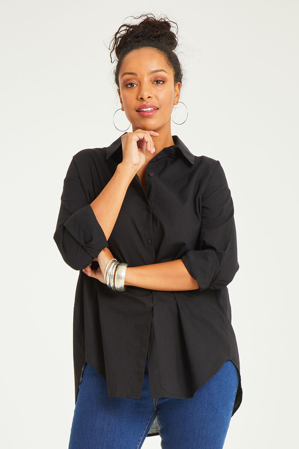 Model Noli wearing size 14 of the Relaxed Elegance Boyfriend Shirt in colour Black (Black), from the front, cropped image