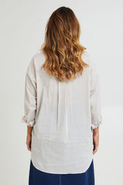 Model Laura wearing size 14 of the Relaxed Elegance Boyfriend Shirt in colour Stone, from the back