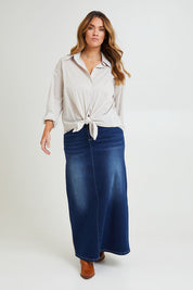 Model Laura wearing size 14 of the Relaxed Elegance Boyfriend Shirt in colour Stone, from the front, showing the whole outfit