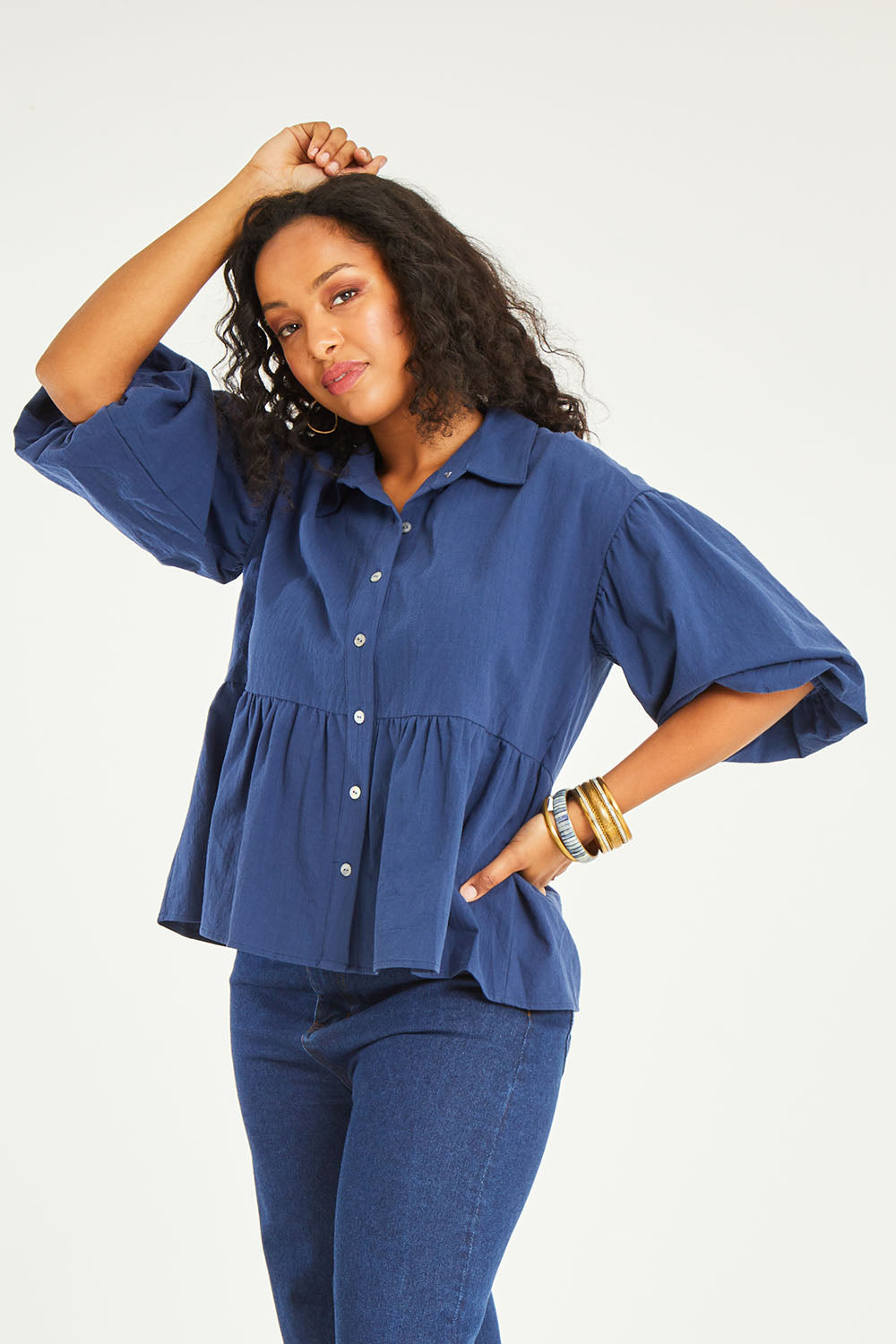Model Noli wearing size 14 of the Daydreaming Billow Sleeve Shirt in colour Blue (Blue), from the front, cropped image