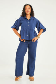 Model Noli wearing size 14 of the Daydreaming Billow Sleeve Shirt in colour Blue (Blue), from the front, showing the whole outfit