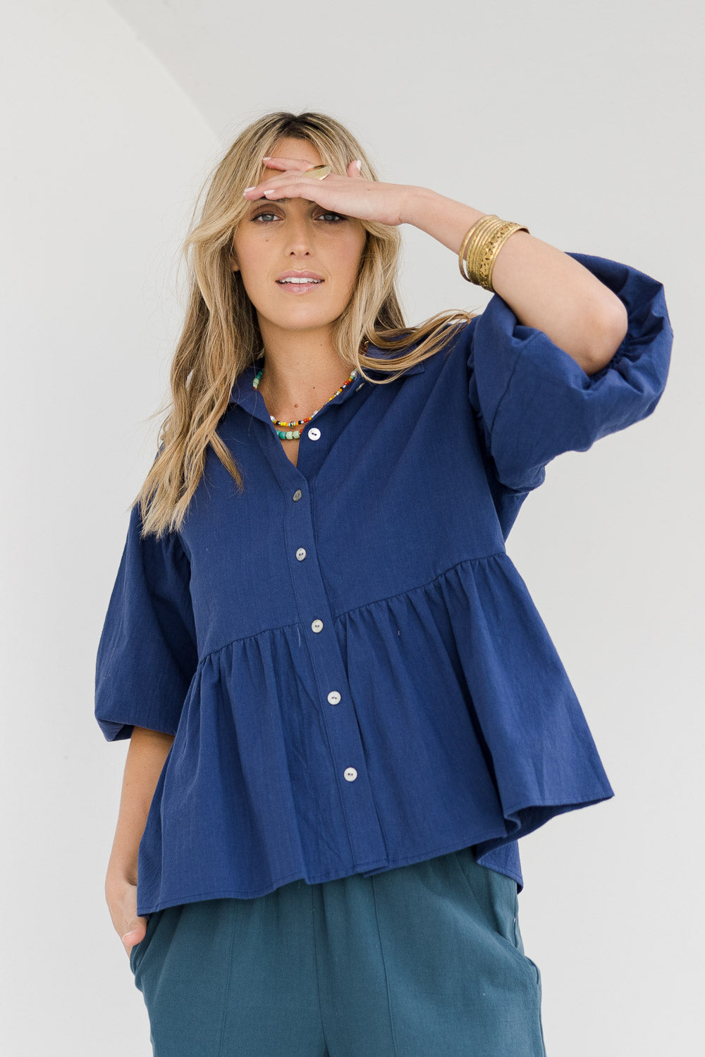 Model Tahlia wearing size 10 of the Daydreaming Billow Sleeve Shirt in colour Blue (Blue), from the front, showing the whole outfit
