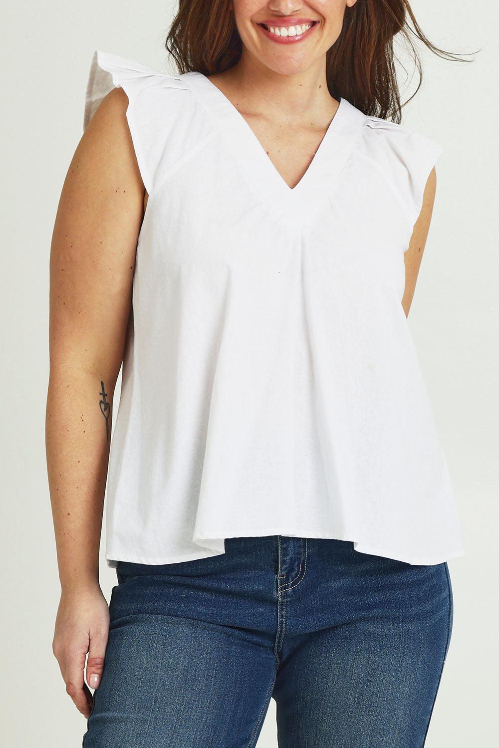 Model Jane wearing size 14 of the Frill Me Cotton Top in colour White (White), from the front, cropped image