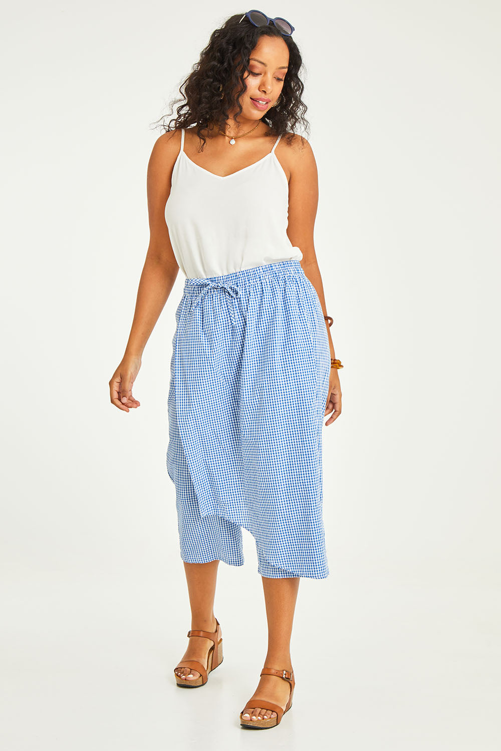 Model Noli wearing size 14 of the Honeypie Cotton Overlay Pants in colour Blue (Blue), from the front, showing the whole outfit