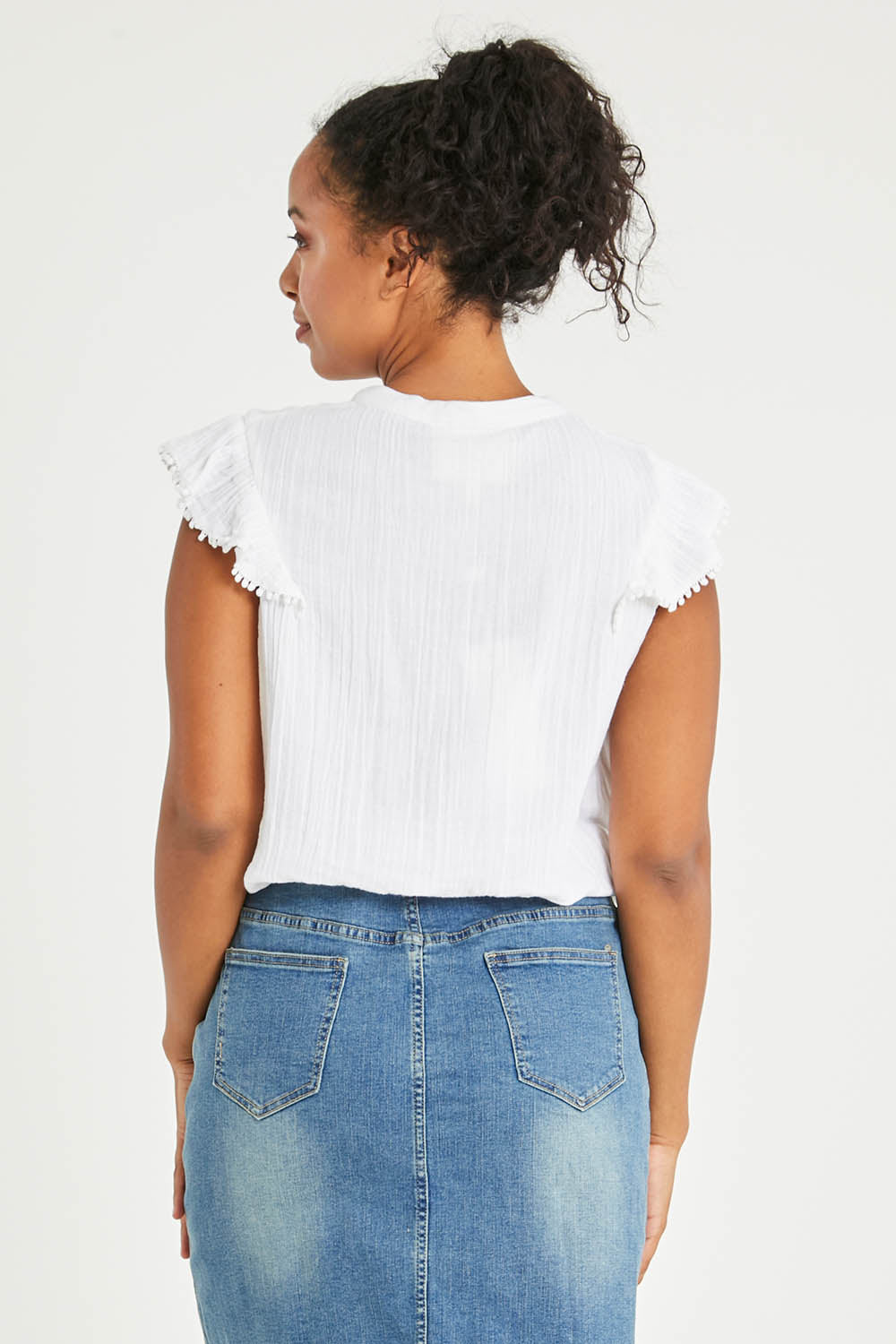 Model Noli wearing size 14 of the Summer Fun Cotton Blouse in colour White (White), from the back